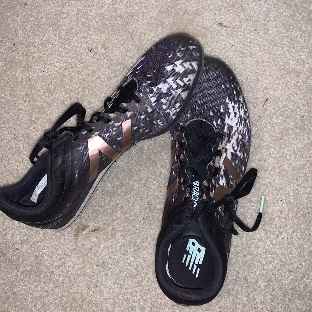 new balance md500 mid distance track spikes